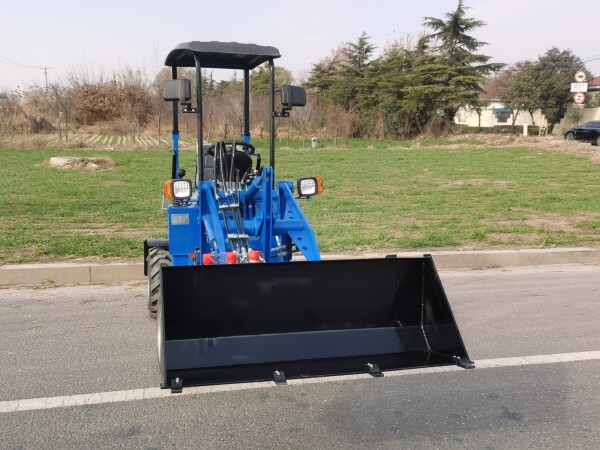 Compact and Powerful Mini Loader Busy at Both Ends